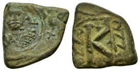 LEONTIUS.(695-698).Constantinople.Follis.

Obv : Crowned facing bust, holding globus cruciger.

Rev : Large K, cross above; uncertain officina below.
...