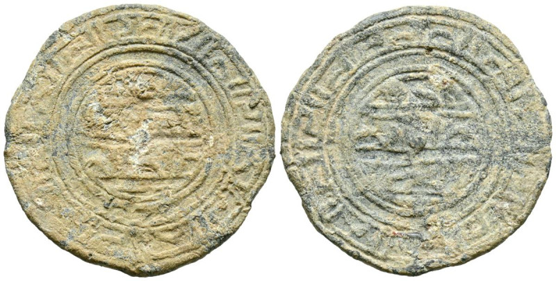 PERIODO DE TAIFAS O ALMORAVIDE. Amuleto monetiforme. (Pb. 4,15g/25mm). Posibleme...