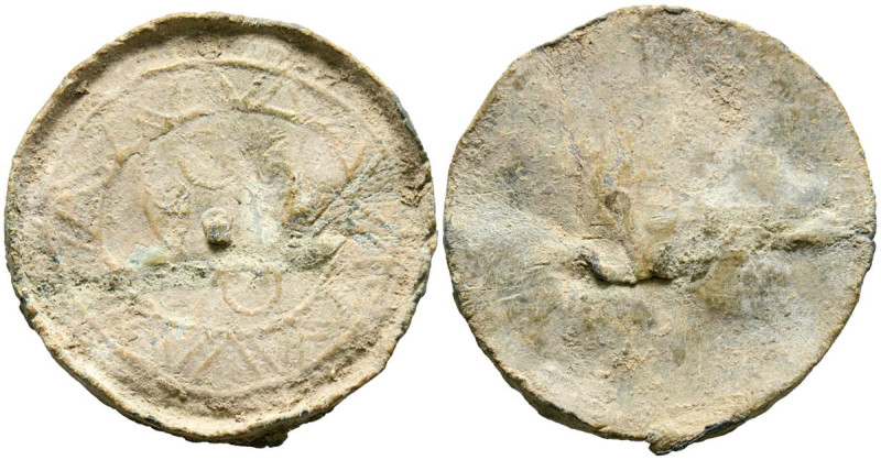 PERIODO DE TAIFAS/ALMORAVIDE. Amuleto monetiforme sin inscripción. (Pb. 10,37g/3...