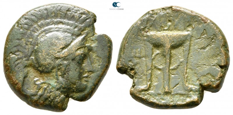 Akarnania. Medeon 300-250 BC. 
Bronze Æ

20 mm., 5,84 g.

Helmeted head of ...