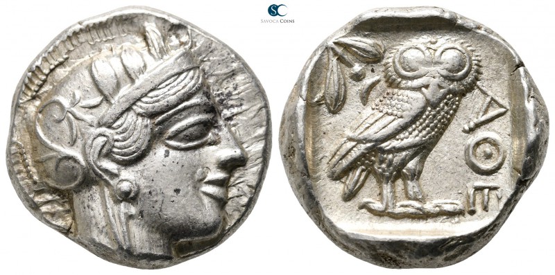 Attica. Athens circa 454-404 BC. 
Tetradrachm AR

24 mm., 17,19 g.

Head of...