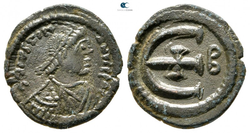 Justinian I AD 527-565. Constantinople
Pentanummium Æ

16 mm., 1,94 g.

D N...