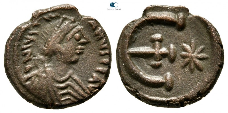 Justinian I AD 527-565. Theoupolis (Antioch)
Pentanummium Æ

14 mm., 2,15 g....