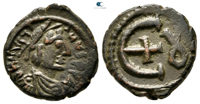 Justinian I AD 527-565. Theoupolis (Antioch)
Pentanummium Æ

15 mm., 2,66 g....