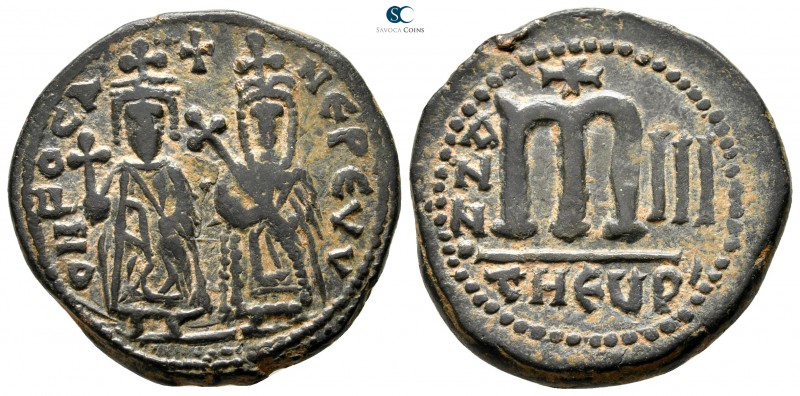 Phocas, with Leontia AD 602-610. Theoupolis (Antioch)
Follis Æ

27 mm., 10,31...