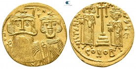 Constans II, with Constantine IV, Heraclius, and Tiberius AD 641-668. Constantinople. 4th officina. Solidus AV