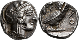 Tetradrachm AR
Attica, Athens, c. 430s-420s BC, Head of Athena to right, wearing crested Attic helmet decorated with three olive leaves and palmette /...