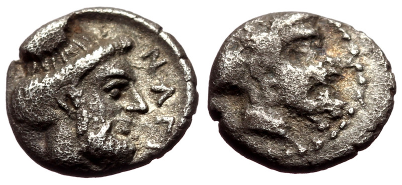 Obol AR
Cilicia, Nagidos, 400-380 BC, Bearded head of Pan to right / NAΓI, Beard...