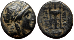 Bronze Æ
Seleukid Kingdom, Antiochos II Theos, 261–246 BC, Laureate head of Apollo right / BAΣΙΛΕΩΣ ANTIOXOY, tripod; anchor below; monograms to left...