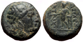Bronze Æ
Seleukid Kingdom, Antiochos III, c. 197-187 BC, Laureate head of Apollo r. / BAΣΙΛΕΩΣ ANTIOXOY, Apollo standing l., testing arrow and resting...