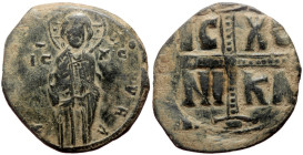 Follis AE
Michael IV the Paphlagonian (1034-1041), Constantinople, Anonymous AE Follis, + EMMANOVHΛ IC-XC, half-length figure of Christ standing facin...
