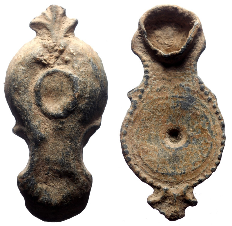 Lead amulete in form of oil lamp, L. 46 mm, 15,94 g