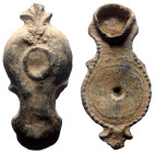 Lead amulete in form of oil lamp, L. 46 mm, 15,94 g