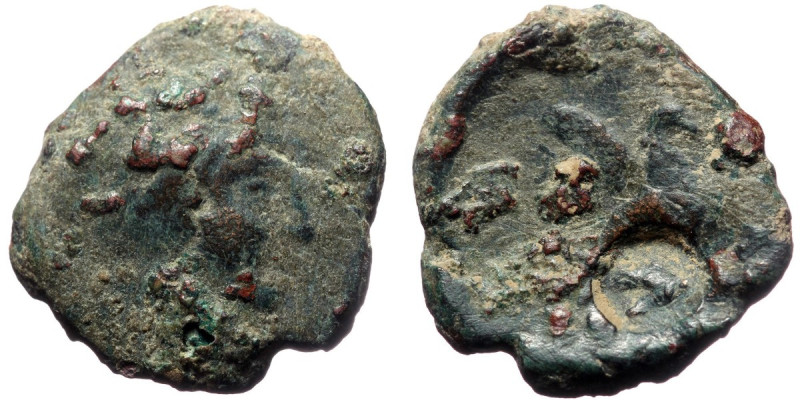 Bronze AE
Unresearched Roman Provincial coin with countermark, Head right / Gryp...
