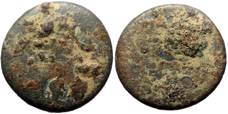 Bronze AE
Unreaserched Roman Provincial coin with countermark, blank except for ...