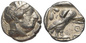 Attika. Athen.

 Tetradrachme (Silber). Ca. 454 - 404 v. Chr.
Vs: Kopf der Athena mit ölzweiggeschmücktem attischem Helm, Ohranhänger und Halskette...