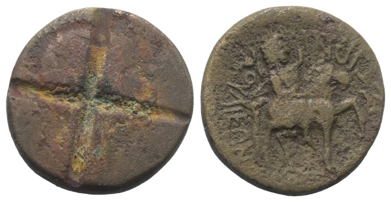 Münzgewichte.

 Solidusgewicht (Bronze).
Vs: Eingraviertes Kreuz.
Rs: Mên zu...