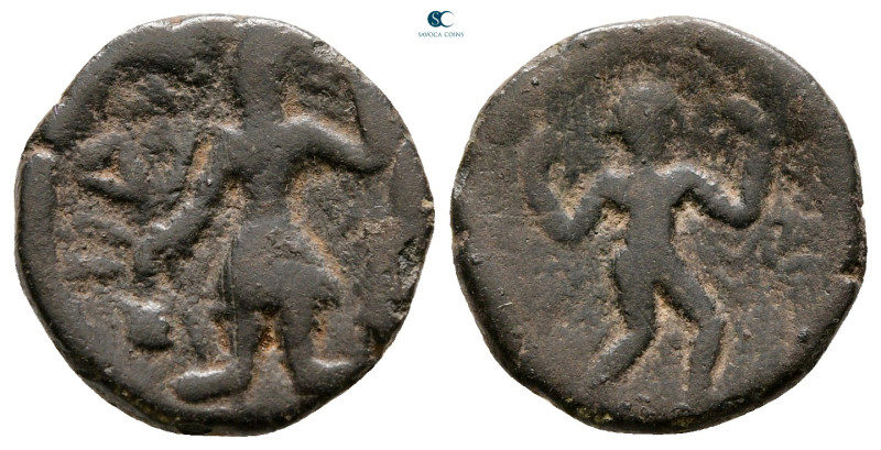 Kushan Empire. Kanishka I AD 127-152. 
Drachm Æ

16 mm, 2,89 g



Fine