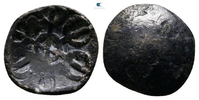 India. Gandhara, early northern trade coinage 500-300 BC. 
1/8 Satamana AR

1...