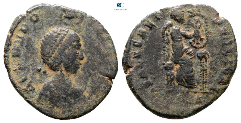 Aelia Eudoxia AD 400-404. Uncertain mint
Follis Æ

19 mm, 2,22 g



Fine