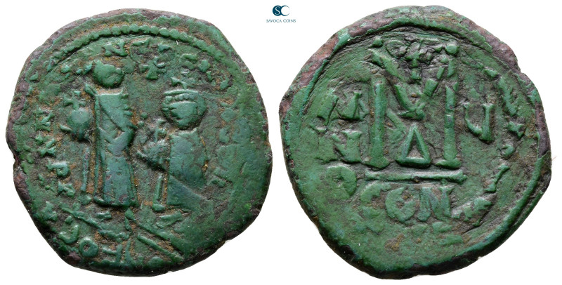 Heraclius with Heraclius Constantine AD 610-641. Constantinople
Follis or 40 Nu...