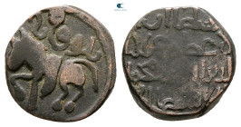 . Taliqan mint  AH 596-617. Khwarizmshahs , Ala al-Din Muhammad  , Ghor horseman type , holding long spear or lance horizontaly. AE Jital