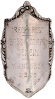 Sonstige militär. Gegenstände
Hamburg: Fahnennagel, Silber 800, graviert TREUE FEST GARDE CORPS VEREIN WANDSBEK 7.3.25. 78 X 45 mm; 10,01 g. vorzügli...