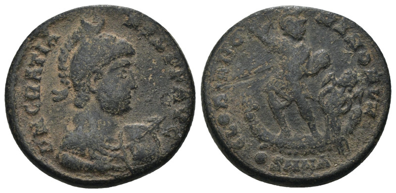 Gratian. (392-395 AD). Follis. Nicomedia. Obv: D N GRATIANVS P F AVG. helmeted a...