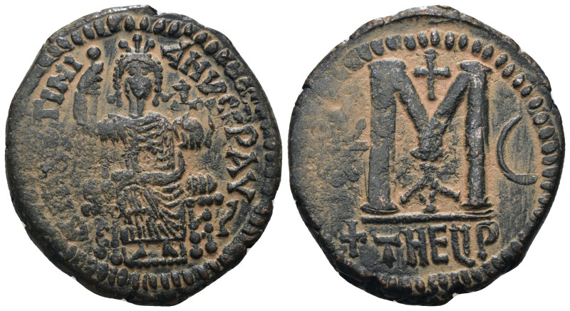 Justinian I. (527-565 AD) Follis. Theoupolis. Obv: Justinian sitting enthroned f...