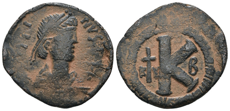 Justinian I. (527-565 AD). 1/2 Follis. Constantinople. Obv: diademed bust of Jus...