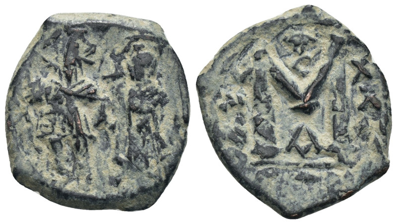 Phocas and Leonita. (602-610 AD) Æ Follis. Constantinople. Obv: Phocas and Leoni...