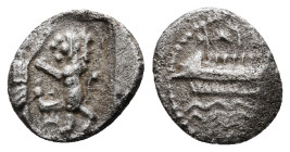 SAMARIA. 'Middle Levantine' Series. Circa 375-333 BC. Obol Obv : Persian king or hero, holding dagger in his right hand, standing right, fighting lion...