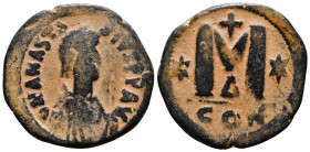 ANASTASIUS I (491-518). Follis. Constantinople.
Obv: D N ANASTASIVS P P AVG.
Diademed, draped and cuirassed bust right.
Rev: Large M; star to left and...