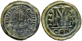 JUSTINIAN I (527-565). Follis. Constantinople. Dated RY 17 (543/4).
Obv: D N IVSTINIANVS P P AVG.
Helmeted, draped and cuirassed facing bust, holding ...
