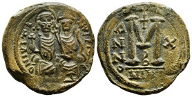 JUSTIN II (565-578). Follis. Nicomedia. Dated RY 10 (574/75).
Obv: D N IVSTINVS P P AVC.
Justin, holding globus cruciger, and Sophia, holding crucif...
