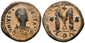 JUSTINIAN I (527-565). Follis. Constantinople.
Obv: D N IVSTINIANVS P P AVG.
Diademed, draped and cuirassed bust right.
Rev: Large M; cross above; sta...