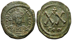 TIBERIUS II CONSTANTINE (578-582). Half Follis. Constantinople.
Obv: D m TIB CONSTANT P P A.
Helmeted, draped and cuirassed bust facing, holding globu...