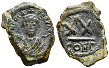 Phocas, 602-610. Half Follis Constantinopolis, 603-610. δ m FOCA P P AVG Crowned bust of Phocas facing, wearing consular robes and holding mappa in hi...