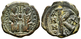 Justin II (565-578) AE half follis Constantinople
Obv: IVSTI - NVS P P A, Justin on left and Sophia on right seated facing on double-throne, both nimb...