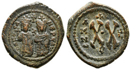 PHOCAS with LEONTIA (602-610). Half Follis. Antioch.. Obv: D N FOCA NЄ PЄ AVG. Phocas, holding globus cruciger, and Leontia, holding cruciform sceptre...