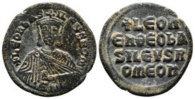 LEO VI.(886-912).Constantinople.Follis.
Obv : LEON S ALEXANDROS.
Leo on left and Alexander on right, both crowned and wearing loros, seated facing on ...