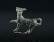 Roman Bronze Dog Figurine
1st-4th century A.D.
Condition : See picture. No returns are accepted.
17,91 g - 31x34 mm