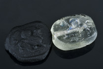 A very fine achaemenid glass(?) seal with Lamassu
A mythical creature from ancient Mesopotamian mythology. The Lamassu is depicted as a human-headed ...