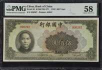 (t) CHINA--REPUBLIC. Bank of China. 500 Yuan, 1942. P-99. PMG Choice About Uncirculated 58.
Serial number 936267. Brown on light green and multicolou...