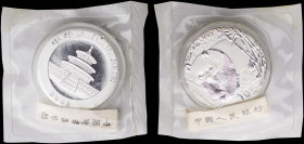 CHINA / PEOPLE'S REPUBLIC: 10 Yuan (2002) in silver (0,999). Temple of Heaven with incuse legend on obverse. Panda walking left through bamboo on reve...