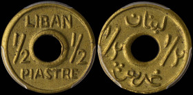 LEBANON: 1/2 Piastre (ND 1941) in brass. Hole in center flanked by English value on obverse. Hole in center flanked by value on reverse. Inside slab b...