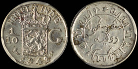 NETHERLANDS / EAST INDIES: 1/10 Gulden (1942 S) in silver (0,720). Crowned coat of arms divide value on obverse. Inscription within circle on reverse....