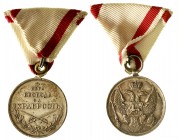 Orden und Ehrenzeichen, Montenegro
Silberne Tapferkeitsmedaille, 3. Modell ab 1862 am Dreiecksband. 36 mm.
sehr schön/vorzüglich, schöne Patina