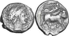 Greek Italy. Central and Southern Campania, Neapolis. AR Didrachm, c. 300 BC. Obv. Head of nymph right, wearing taenia; surrounded by four dolphins. R...