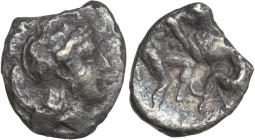 Greek Italy. Southern Apulia, Tarentum. AR Diobol, 325-280 BC. Obv. Helmeted head of Athena right. Rev. Herakles fighting lion right. Cf. HN Italy 976...